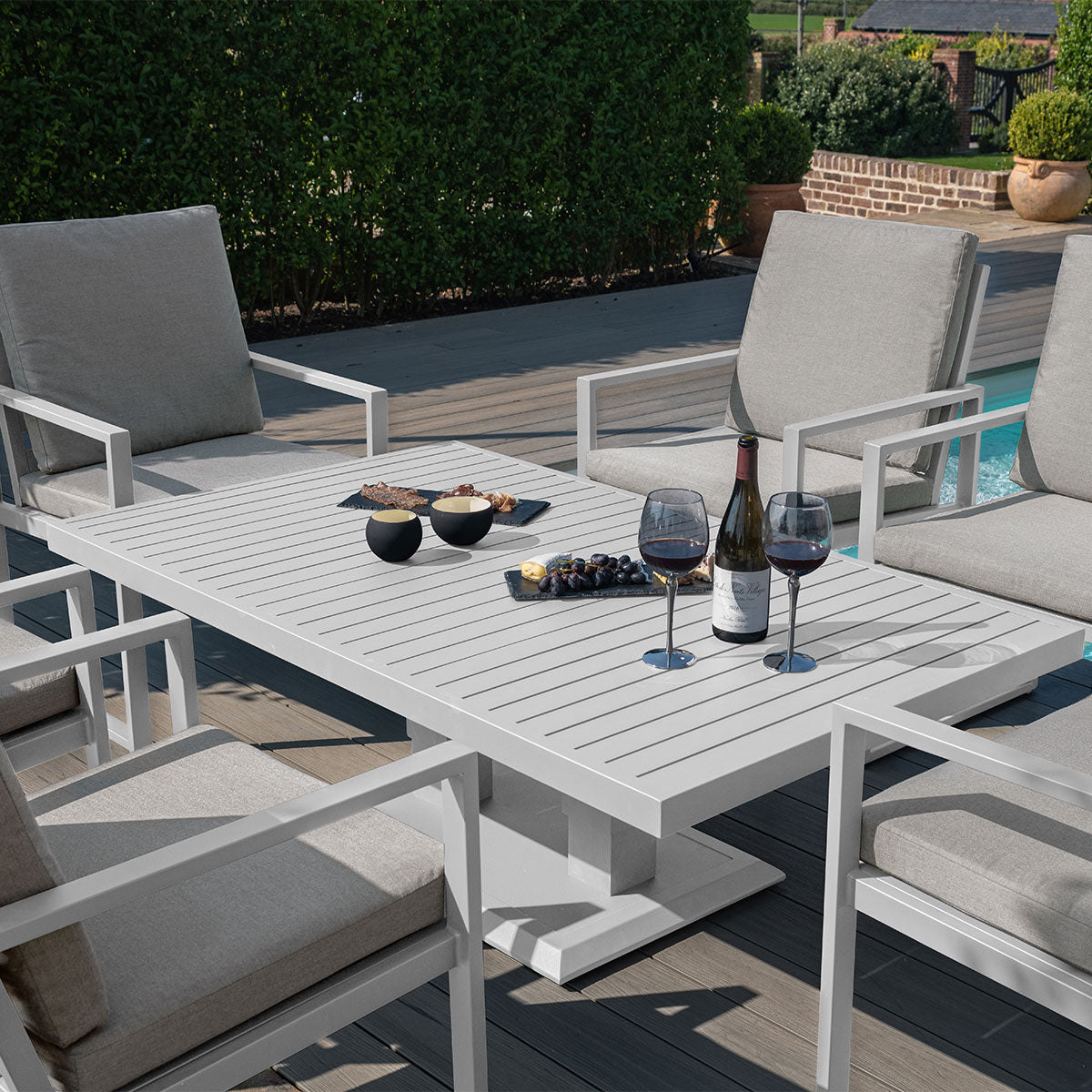 Amalfi 6 Seat Rectangular Dining Set with Rising Table in White