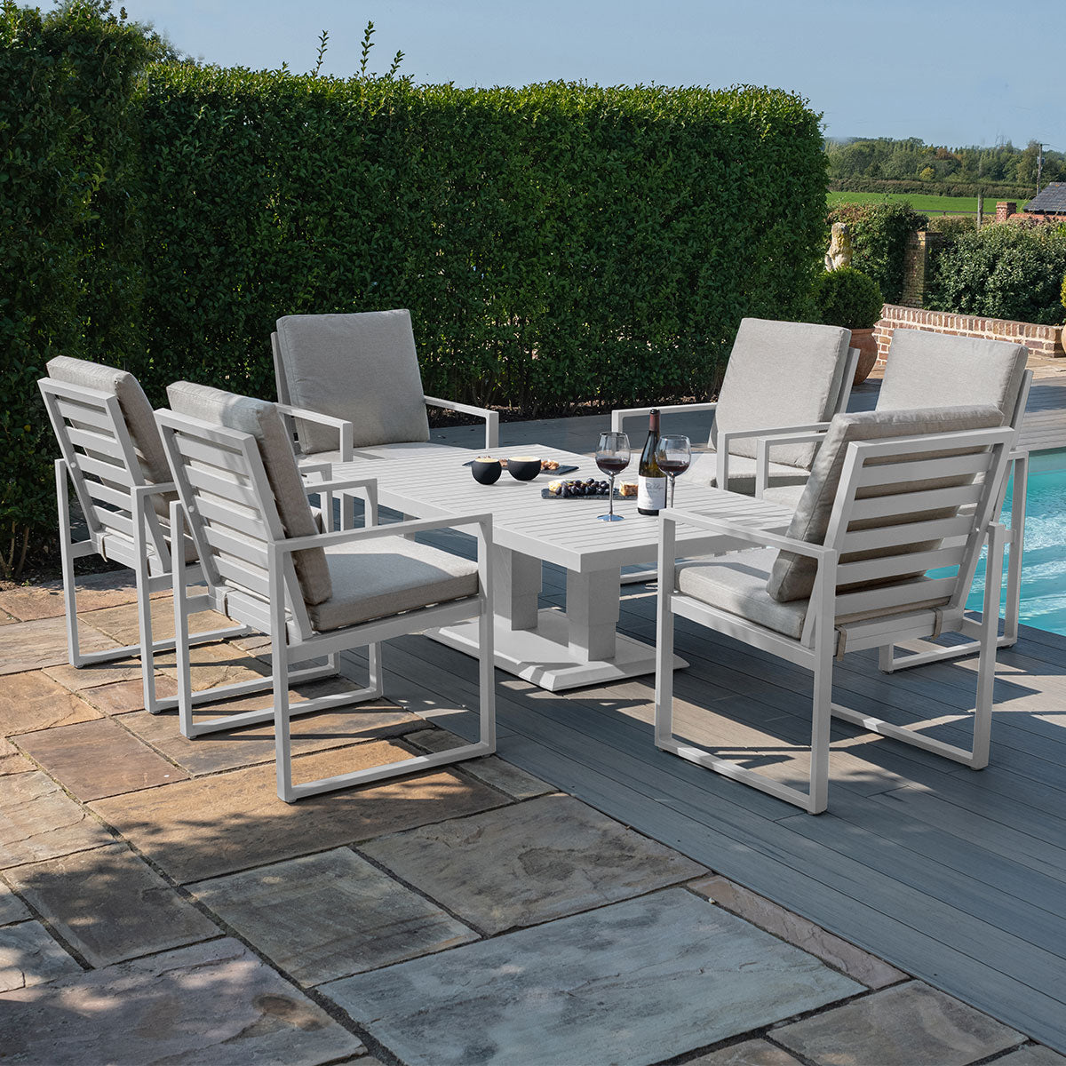 Amalfi 6 Seat Rectangular Dining Set with Rising Table in White