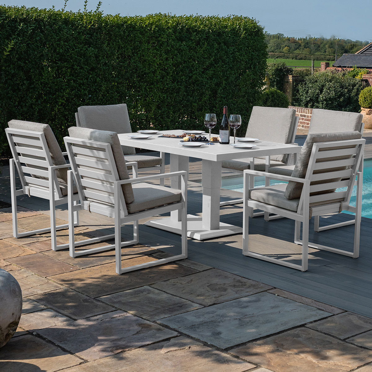 Amalfi 6 Seat Rectangular Dining Set with Rising Table in White