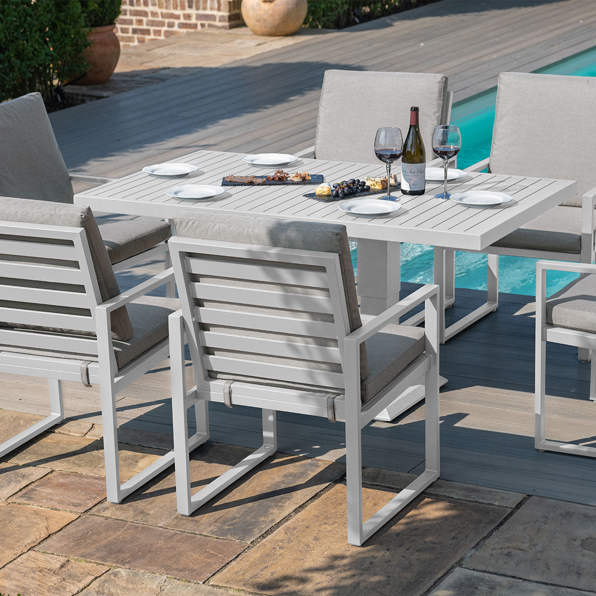 Amalfi 6 Seat Rectangular Dining Set with Rising Table in White