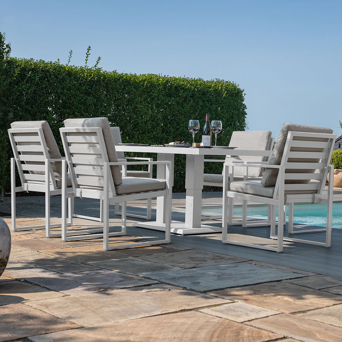 Amalfi 6 Seat Rectangular Dining Set with Rising Table in White