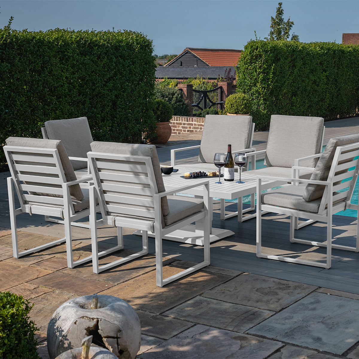 Amalfi 6 Seat Rectangular Dining Set with Rising Table in White